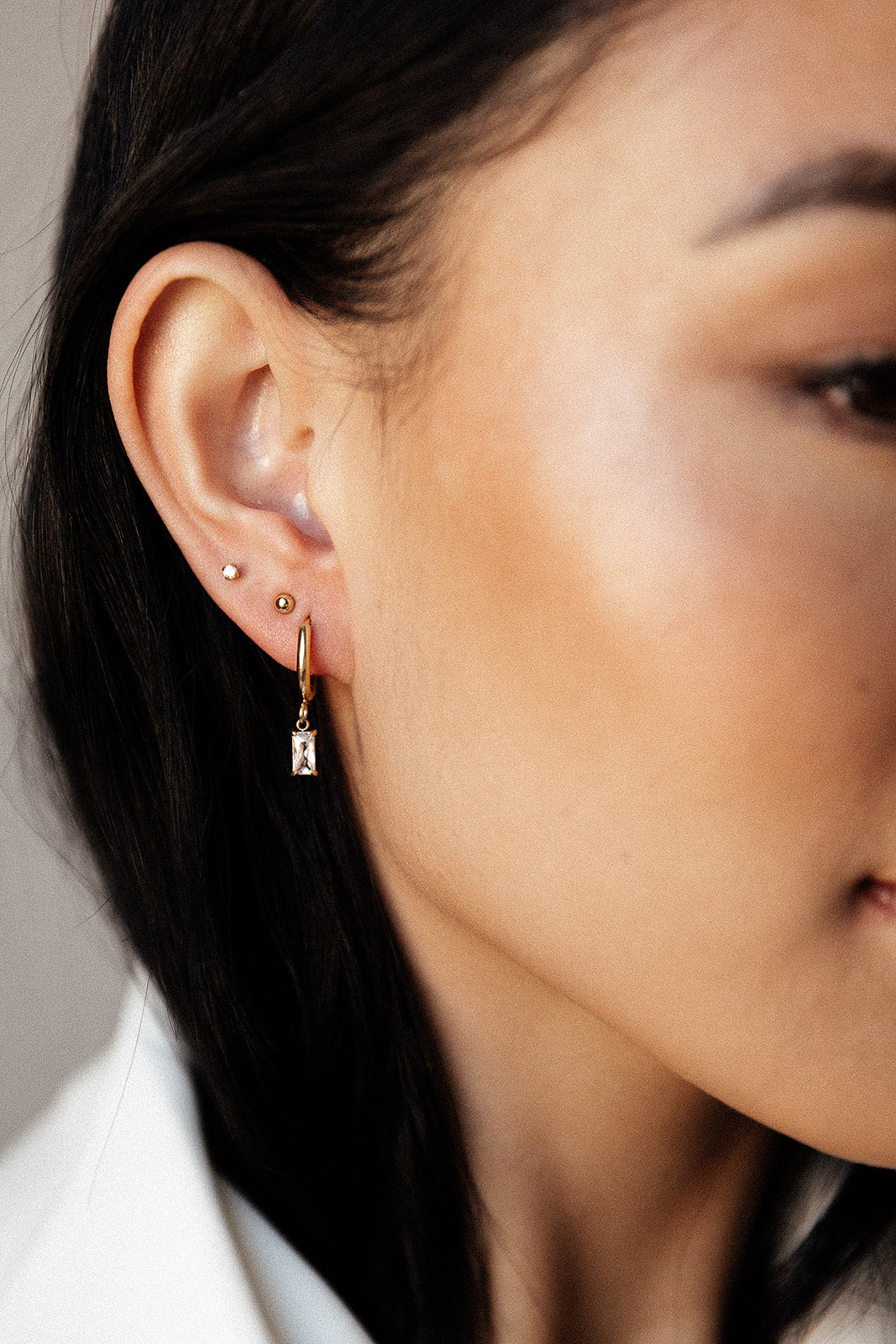 Delilah - Gold Baguette Huggie Earrings