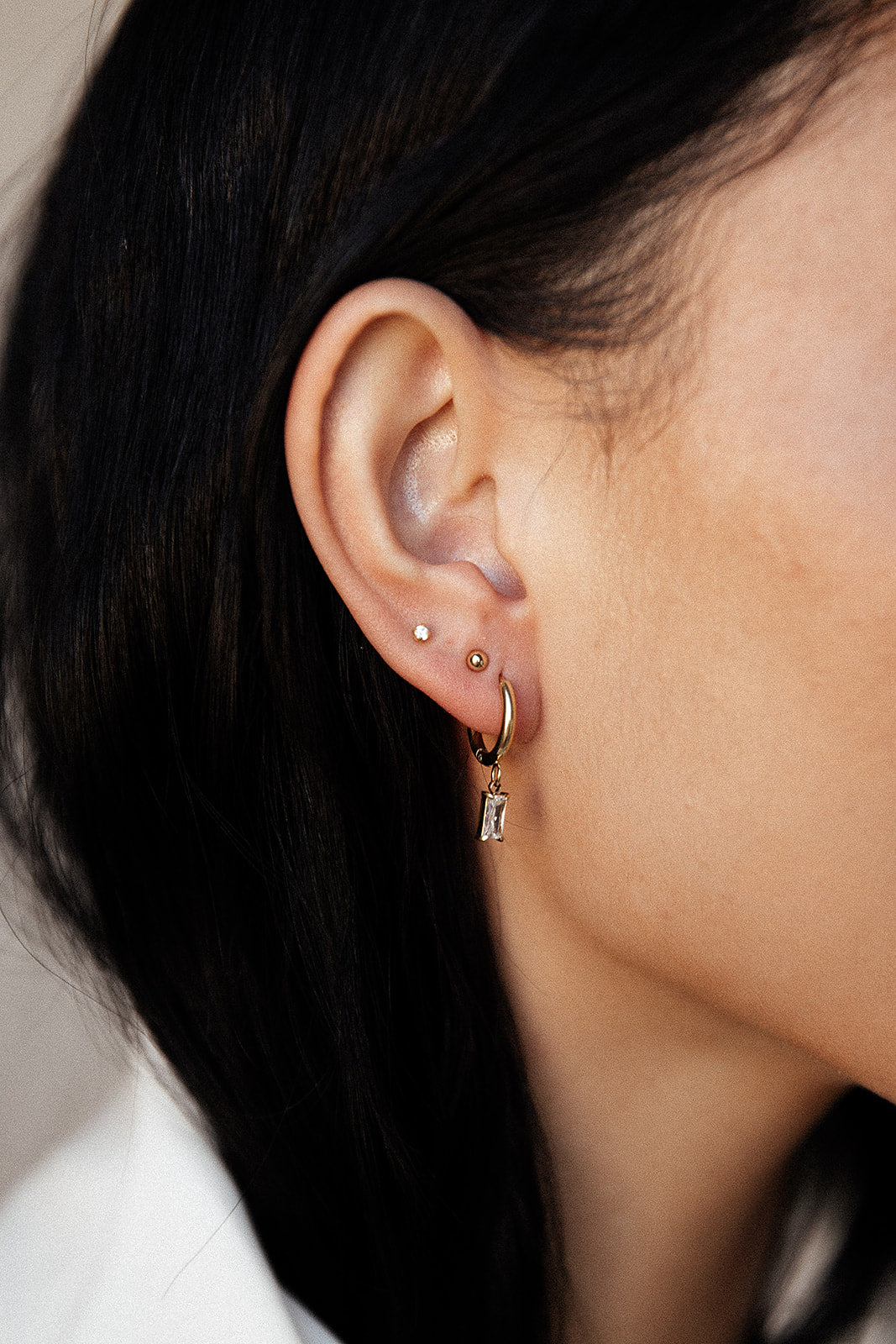 Delilah - Gold Baguette Huggie Earrings